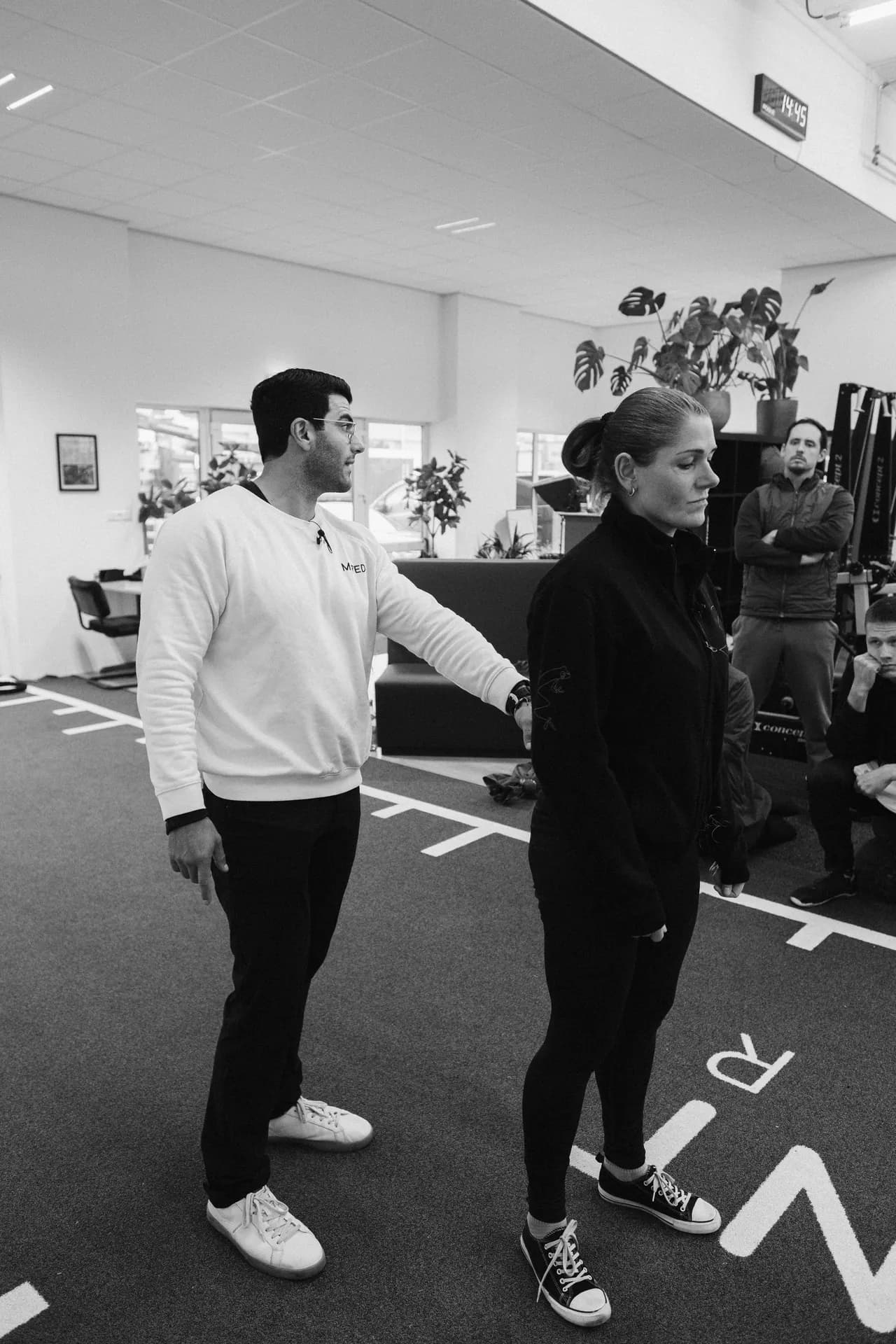 Richard Aceves cueing a coach's posture during a Moved Academy seminar